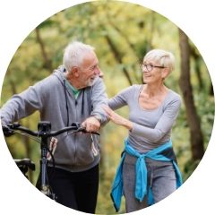 elderly couple walking outside