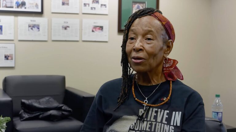 Woman being interviewed about her walk-in tub