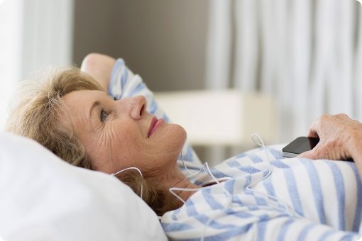 woman listening to music with headphones