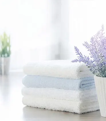 Four towels folded and placed on top of one another