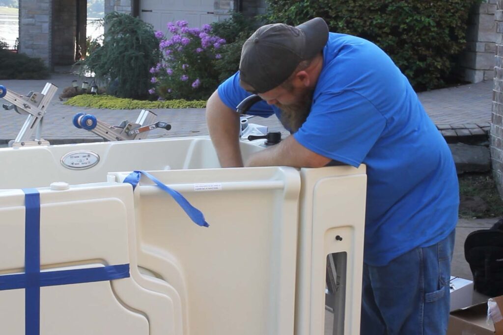 Safe Step installer working on the walk-in tub