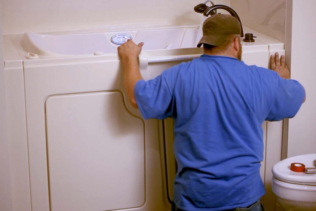 workers installing the walk-in tub