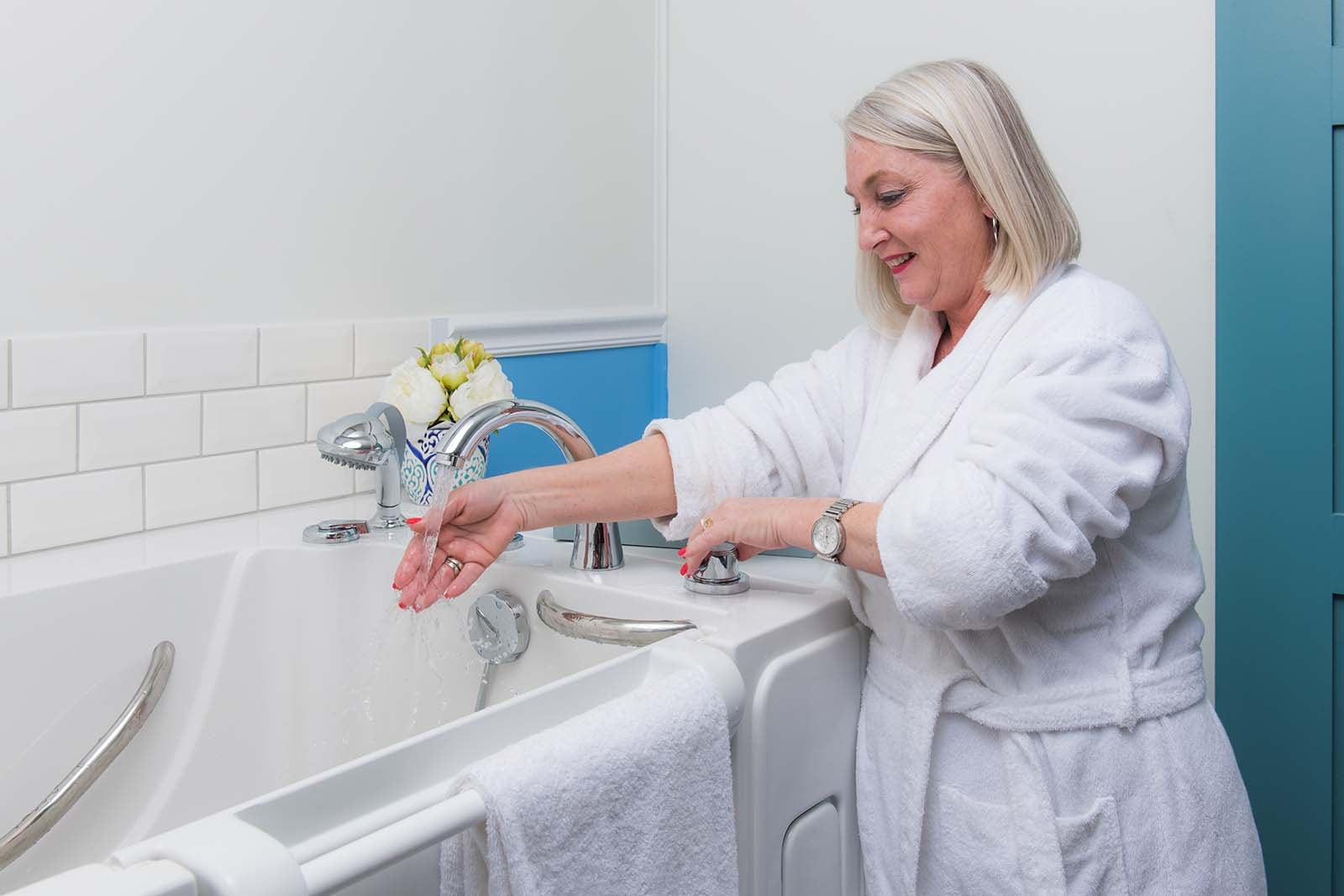 woman quickly filling her tub with a rapid fill faucet