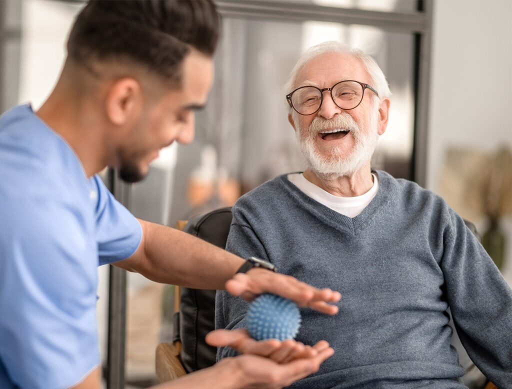 physical therapy using ball in hand