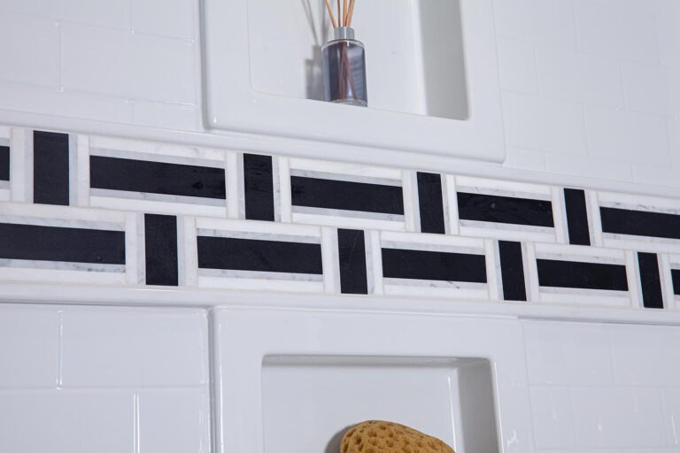 close up of walk in shower tile surround